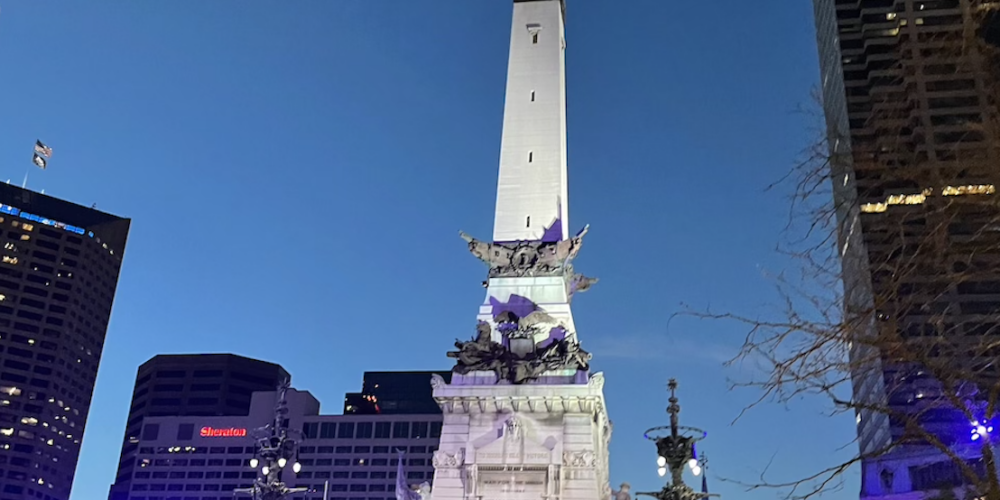 a large white statue in Soldiers' and Sailors' Monument